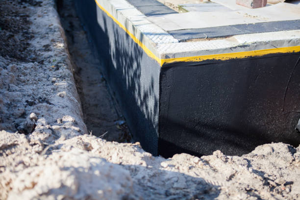 Professional Emergency Waterproofing technician working in Lake, MI